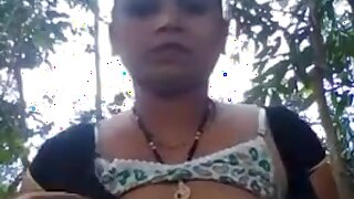INDIAN AUNTY SHOWING BOOBS AND PUSSY IN THE JUNGLE